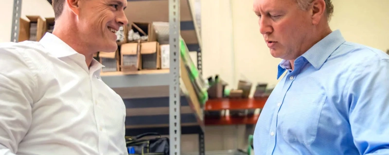 LeafFilter employees discussing the product
