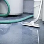 Vacuum sitting in basement water