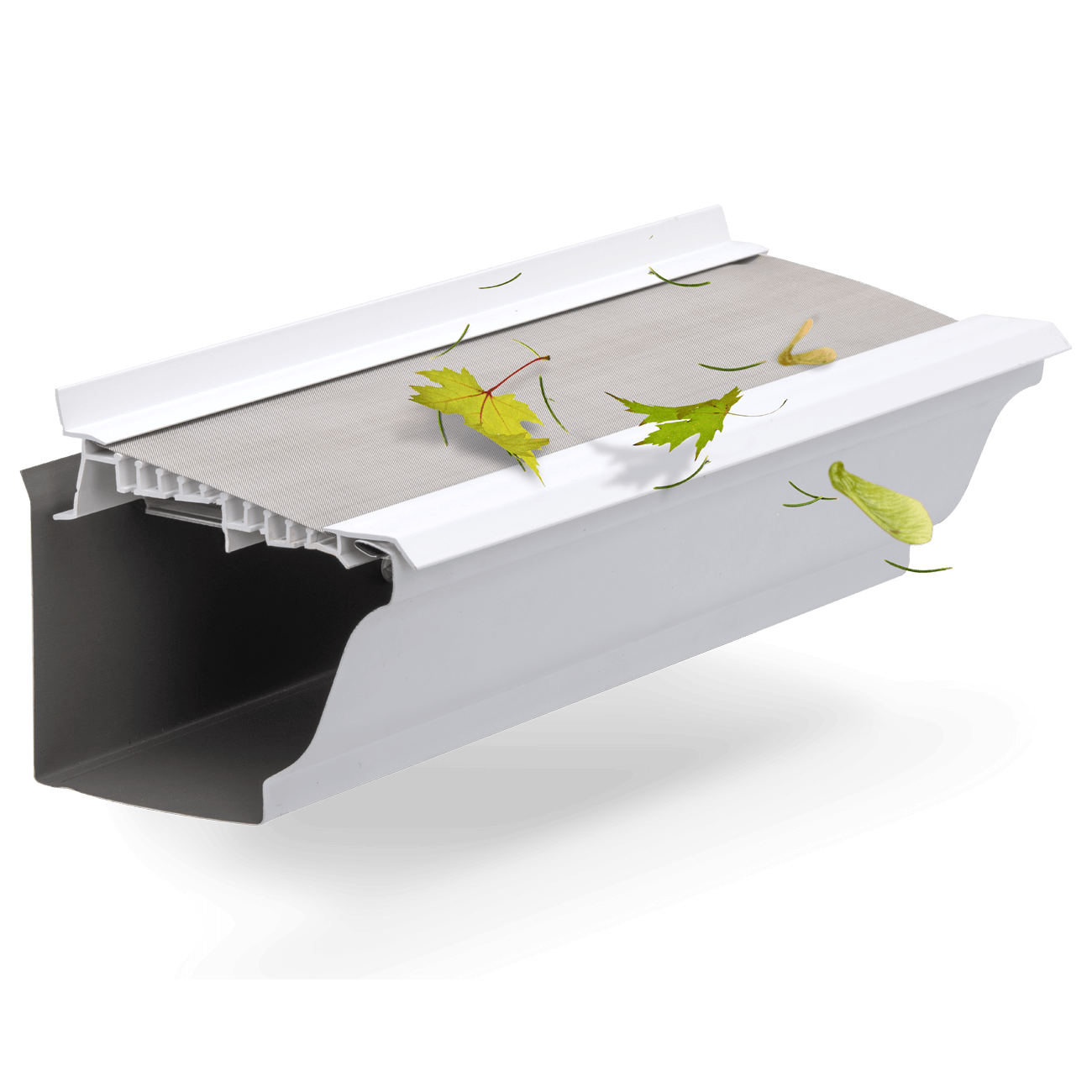 A cross-section of a LeafFilter protected gutter displays its uPVC frame while maple leaves, needles, and spinners shed from the product's screen.
