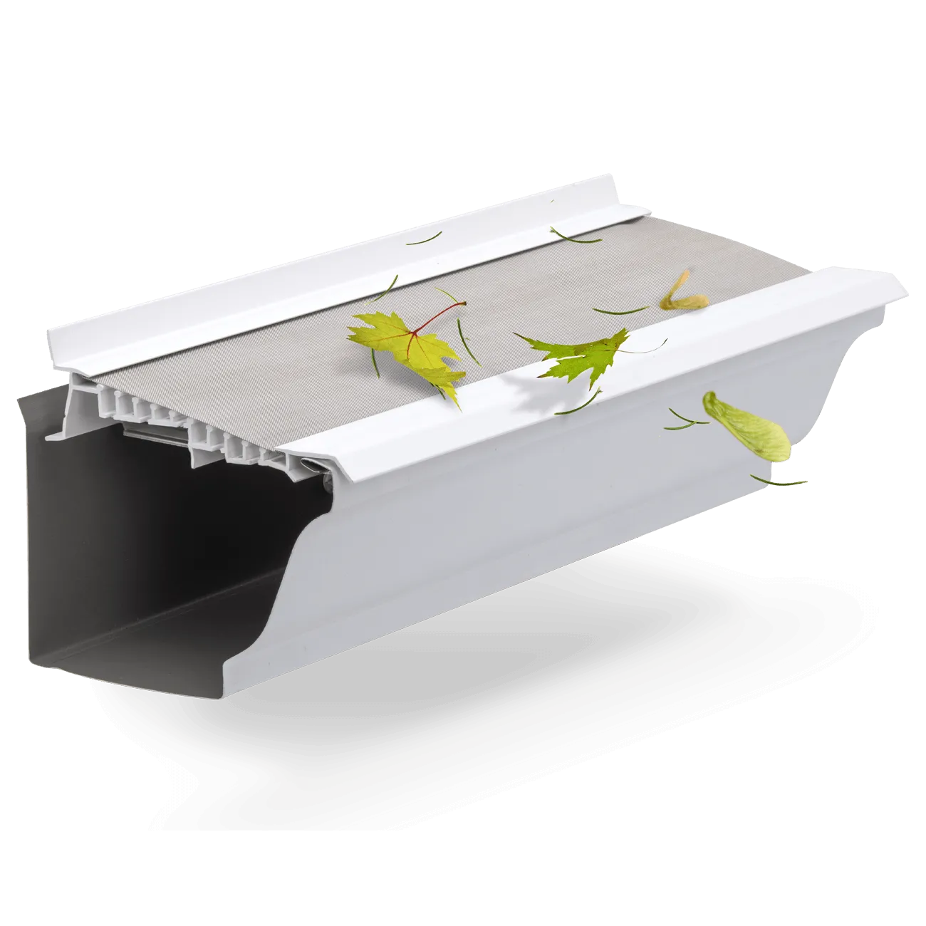 A cross-section of a LeafFilter protected gutter displays its uPVC frame while maple leaves, needles, and spinners shed from the product's screen.