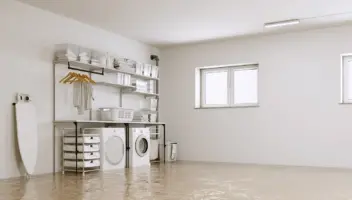 Flooded basement laundry area